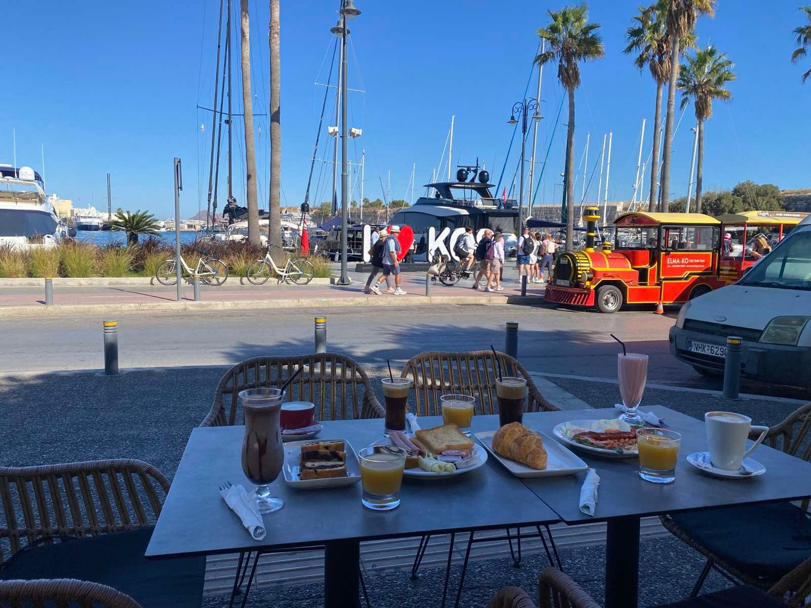 Breakfast and morning coffee overlooking Kos harbour at Sintrivani